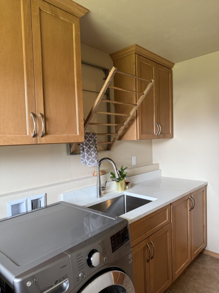 Laundry Room 6 VKB laundry room brown wood interior cabinets