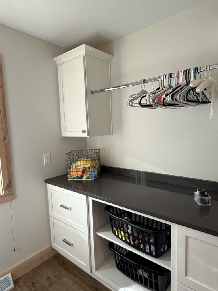 Laundry Room 7 VKB laundry room black and white cabinets