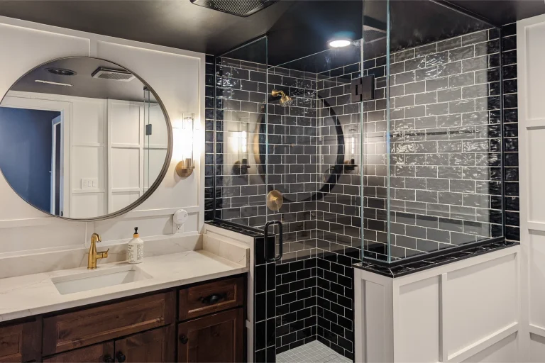 Modern bathroom with black tiles